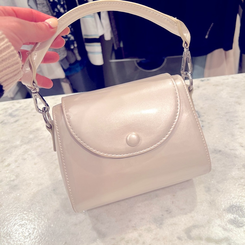 Shiny off white purse